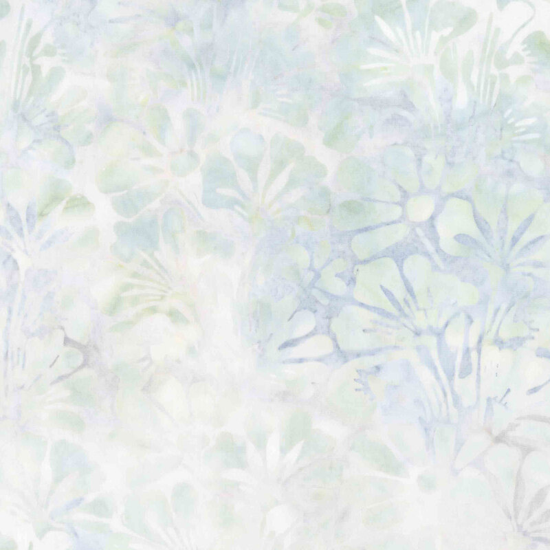 Cream and light denim blue batik overlayed with light teal florals.