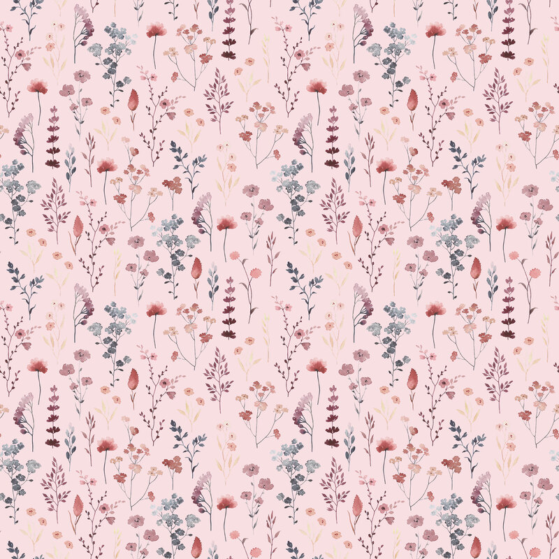 Soft pink fabric with a medley of small florals scattered on top.