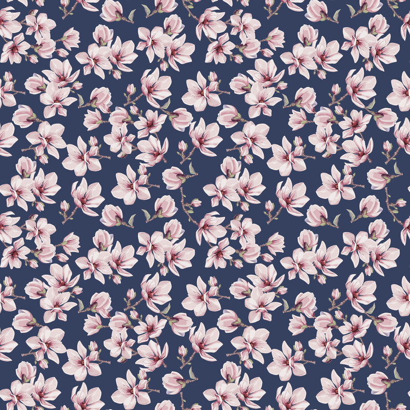 Navy fabric topped with sprigs of magnolias.