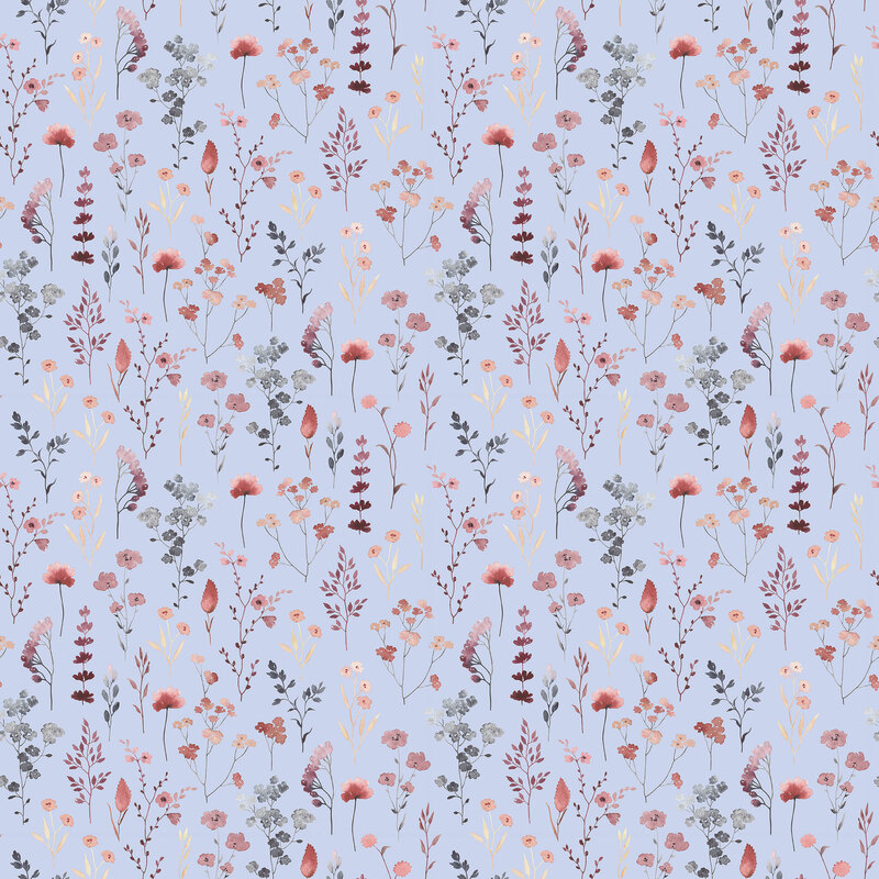 Faded blue fabric with a medley of small florals scattered on top.