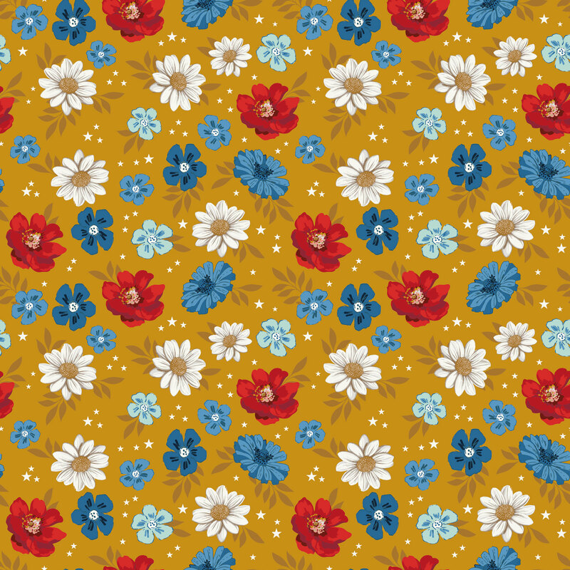 Golden fabric with tossed red, white, and blue florals and white stars.