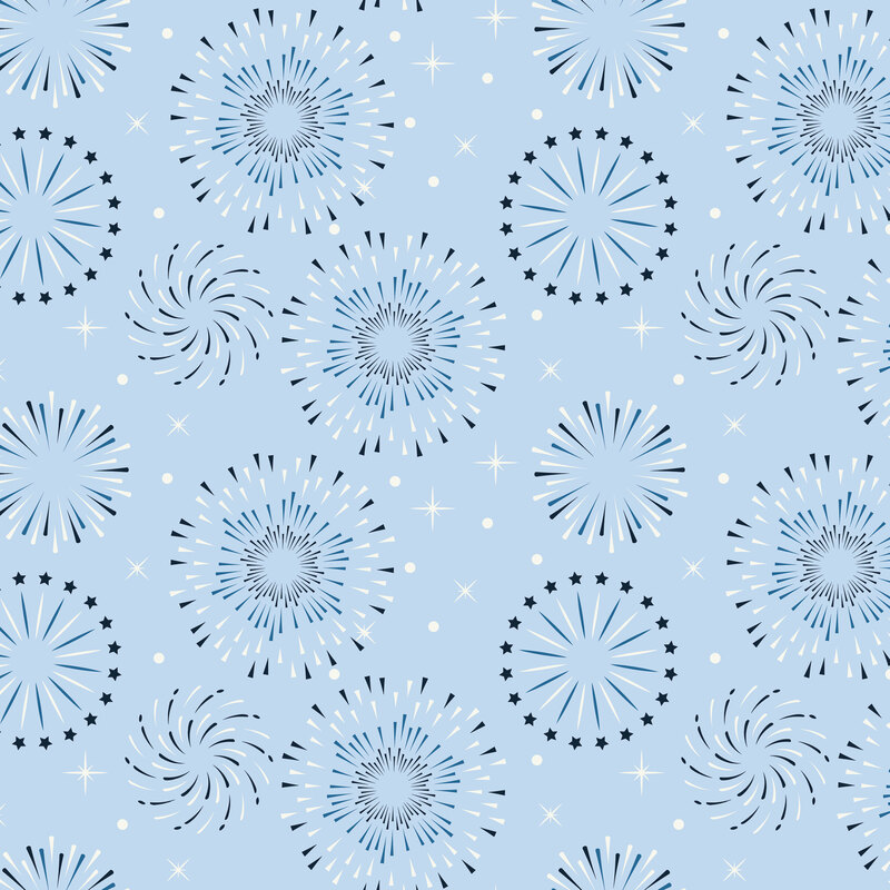 Light blue fabric with bursts of white and navy firework motifs and stars.