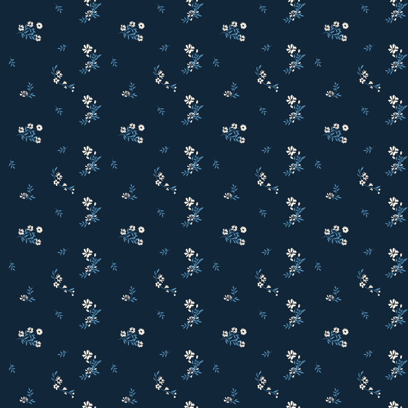 Navy fabric with ditsy tossed pattern of white florals.
