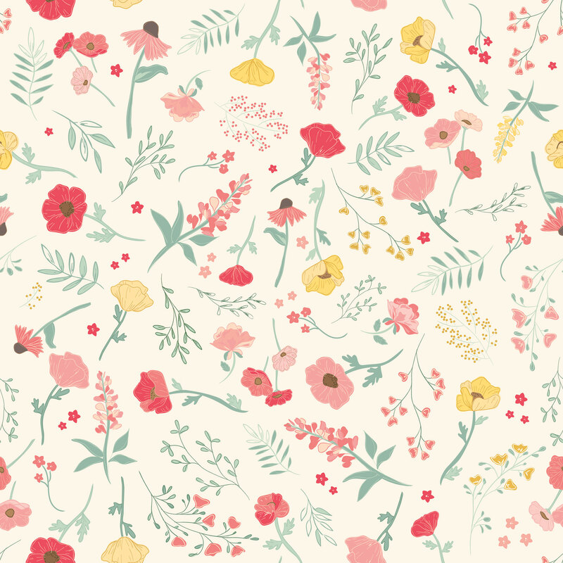 Cream fabric tossed with a medley of botanicals and yellow and pink-scale florals.