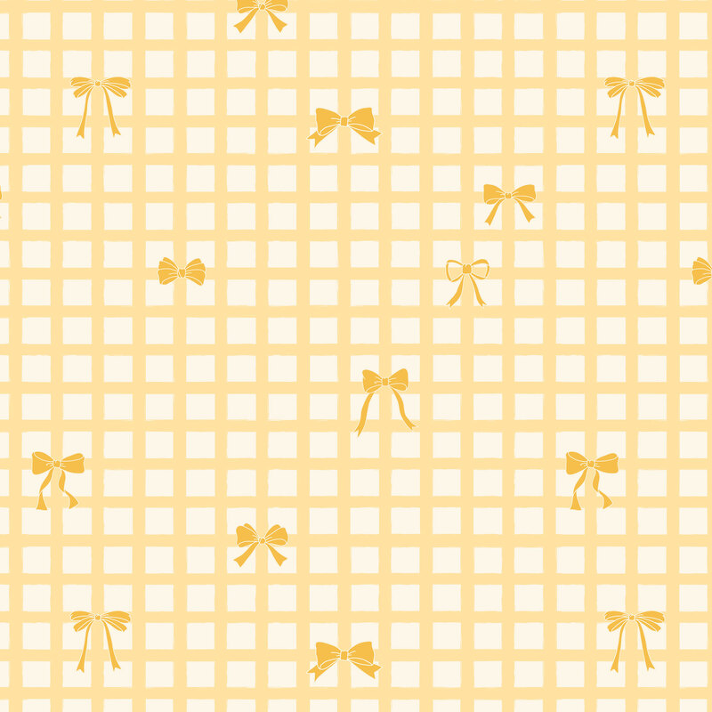 Pastel yellow fabric with tuscan yellow grid tied with mustard-toned bows.