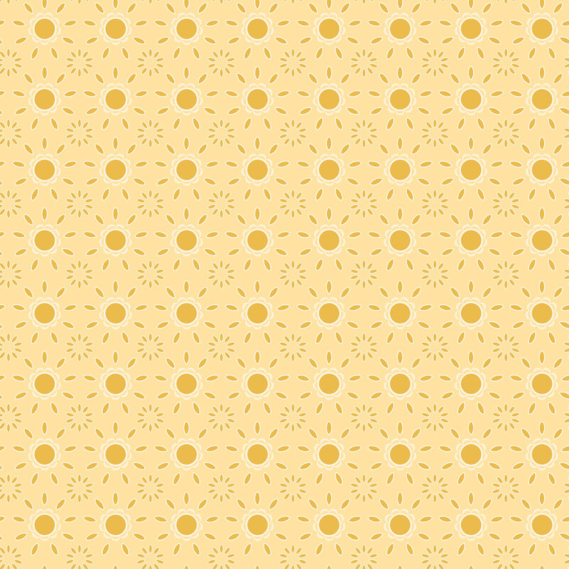 Soft yellow fabric topped with stylized cream and mustard blooming florals and petals.