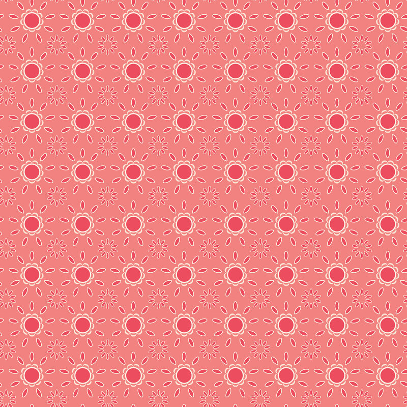 Salmon pink fabric topped with stylized cream and hot-pink blooming florals and petals.