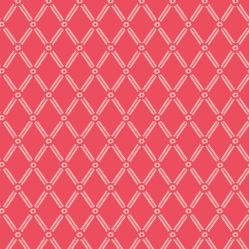 Hot pink fabric with a floral lattice design with lines of pastel pink flower petals spaced by pink blooms.