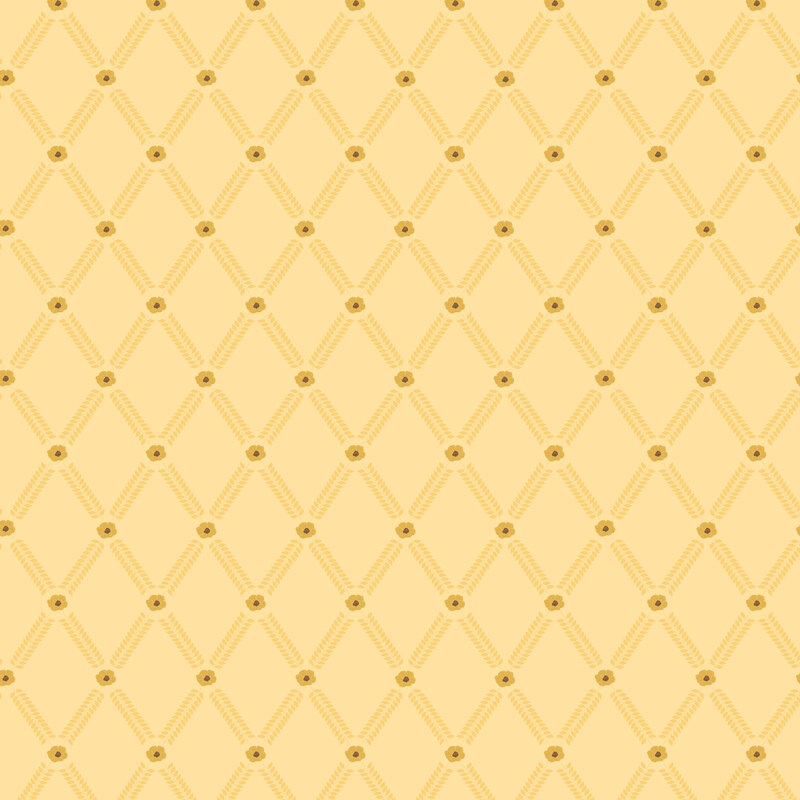 Soft yellow fabric with a floral lattice design with lines of yellow flower petals spaced by mustard blooms.
