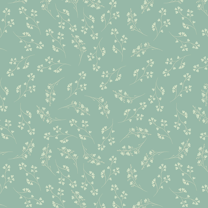 Misty green fabric with tossed sprigs of light sage floral hearts.
