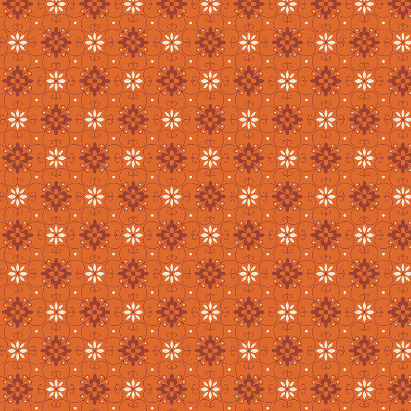 Pumpkin orange fabric with tonal trellis pattern of daisies and dots.