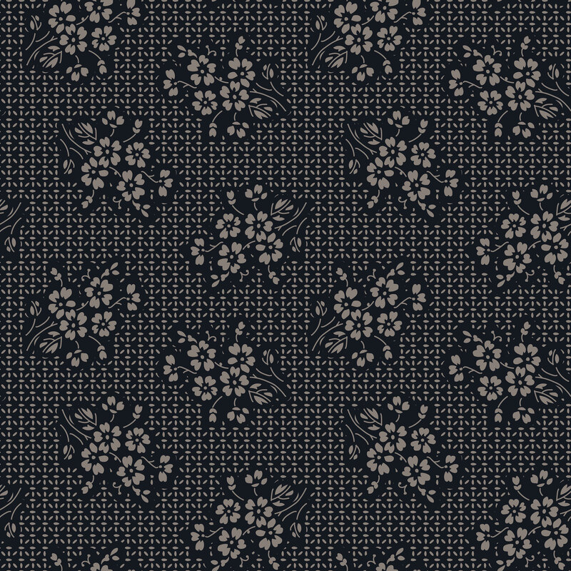 Soft black fabric with stitch-inspired grid topped with patches of tonal florals and petals.