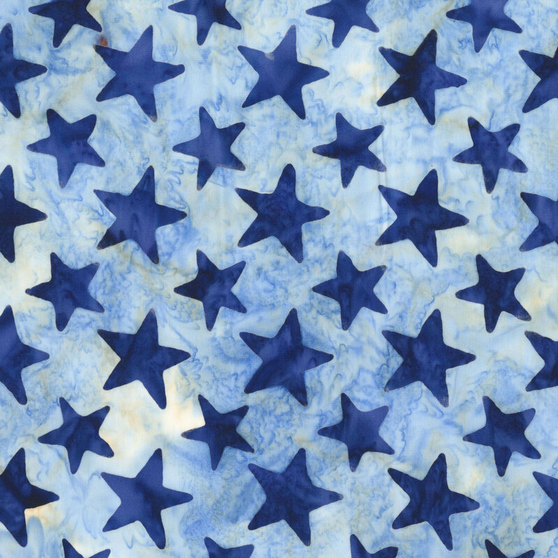 Soft blue batik layered with dark blue stars.