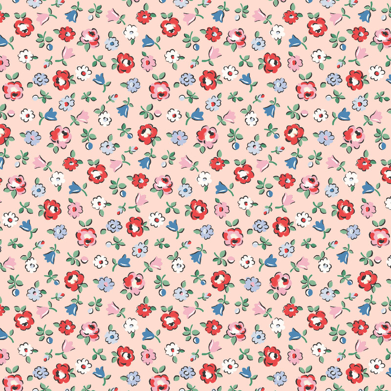 Tossed red, blue, white, and pink floral sprigs on a soft peach background.