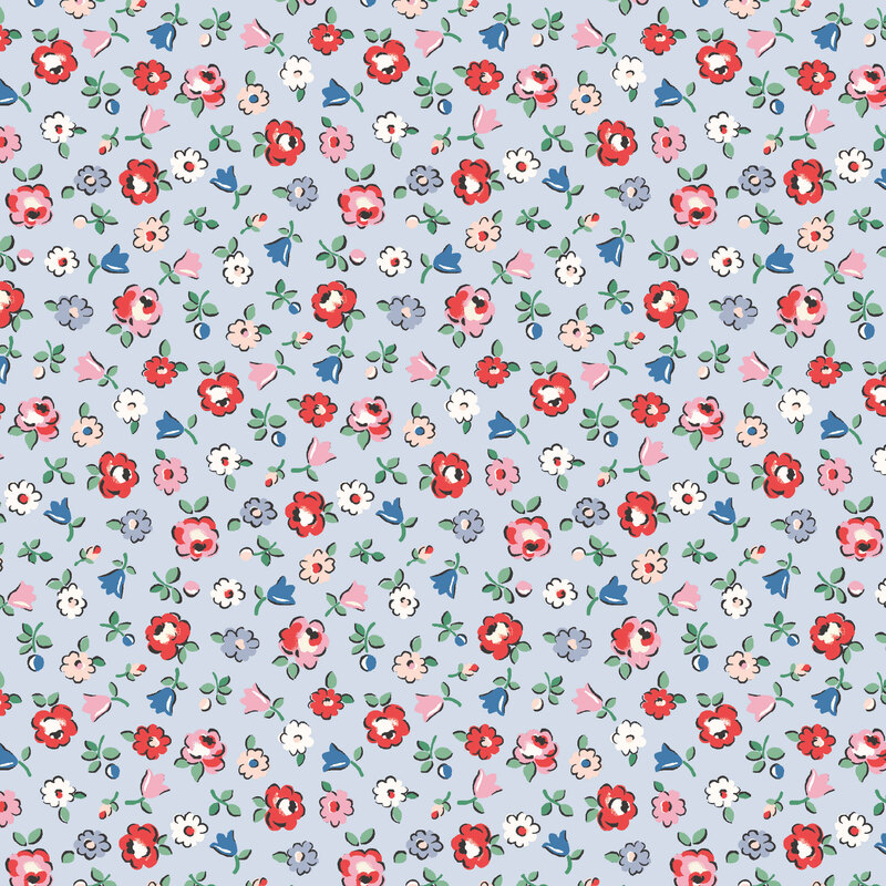 Tossed red, blue, white, and pink floral sprigs on a pale blue background.