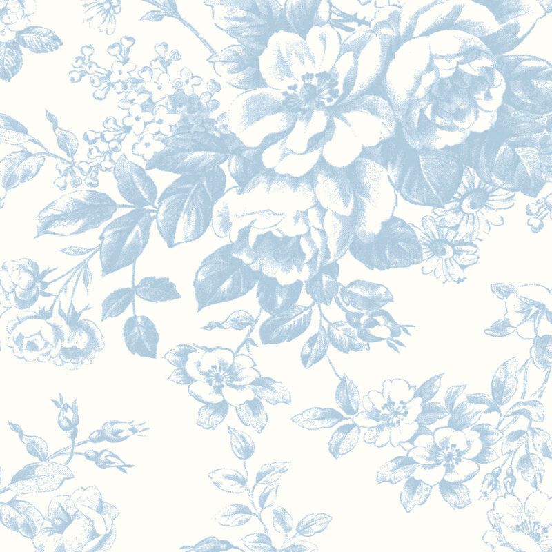 Cream fabric with large blue florals strung across the top.