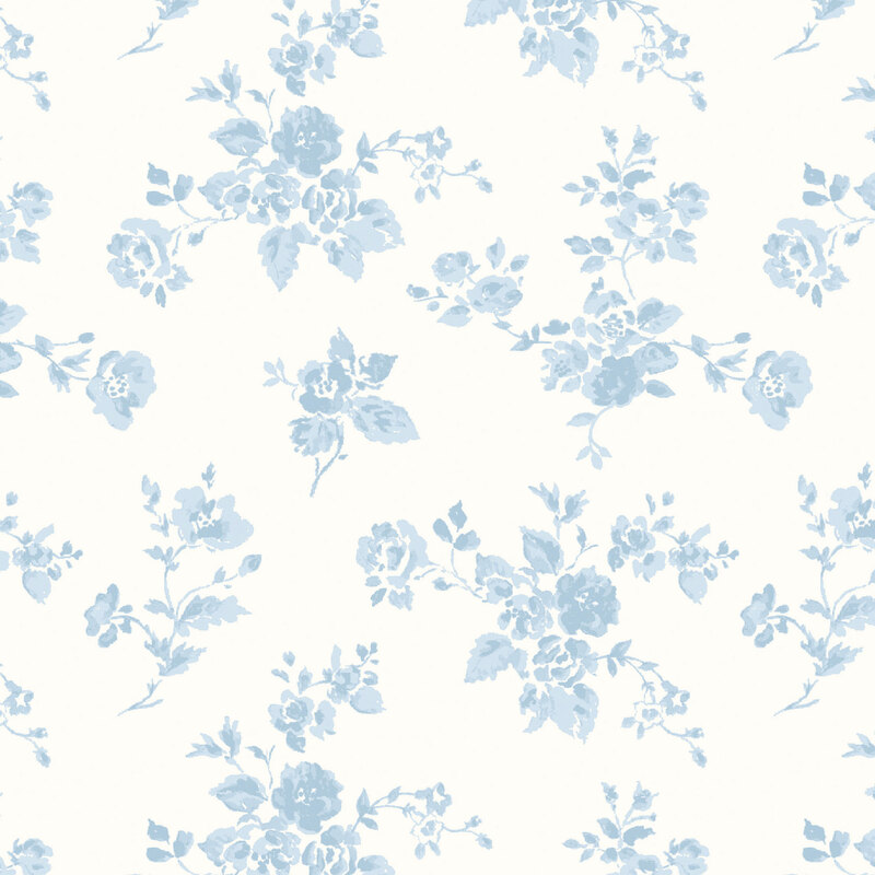 Cream fabric with small blue florals scattered across the top.