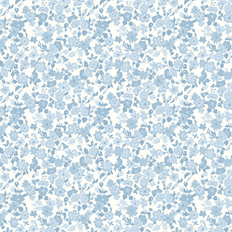 Cream fabric with a calico pattern of powder blue florals packed over the top.
