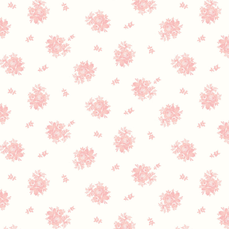 Cream fabric with a ditsy tossed pattern with two different designs of light pink florals.