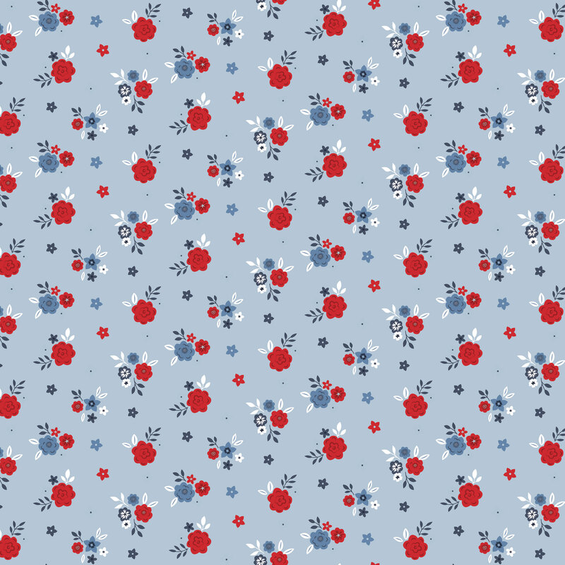 Light blue fabric with ditsy red and blue floral print.