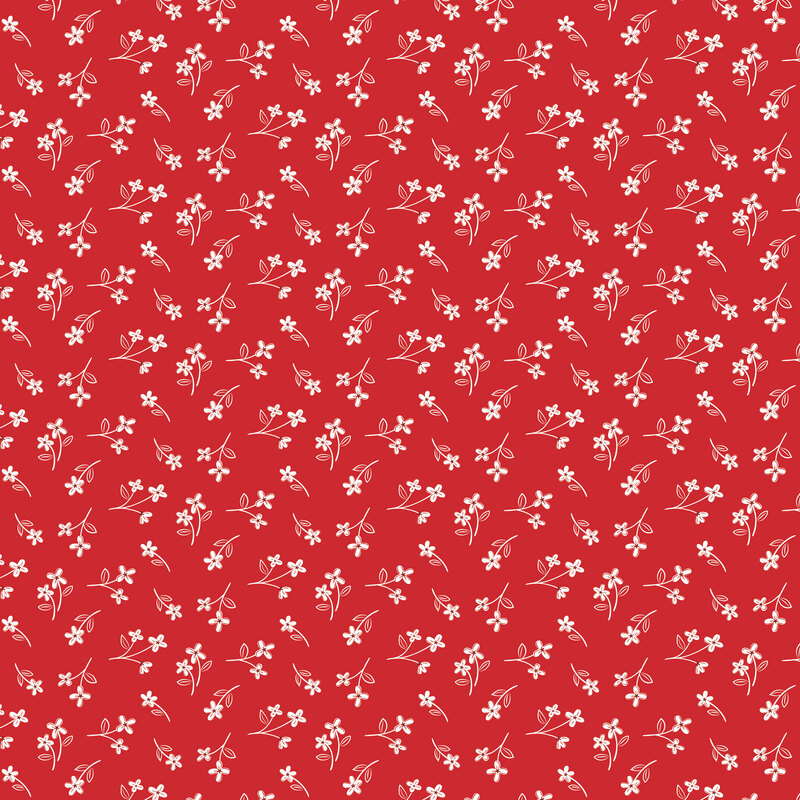 Red fabric tossed with calico print of white florals.