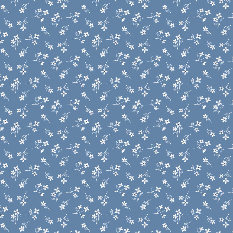 Blue fabric tossed with calico print of white florals.