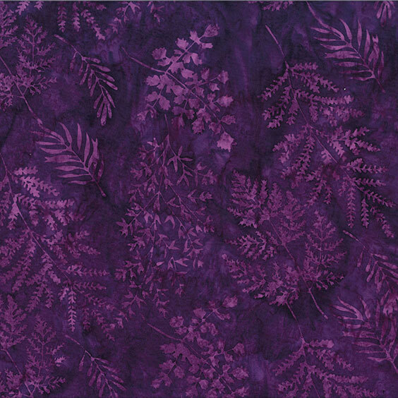 Dark purple batik with brighter purple leaves strewn across the top.