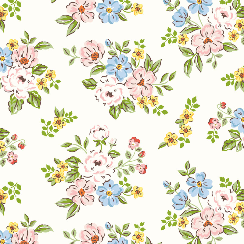 Soft white fabric with tossed floral bouquets in hues of yellow, blue, pink, and white.
