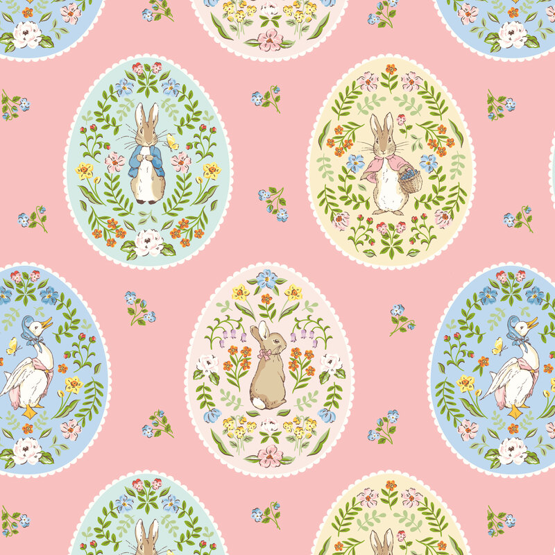 Multicolored eggs filled with florals and a peter rabbit character on a tea rose background with tossed blue floral sprigs.