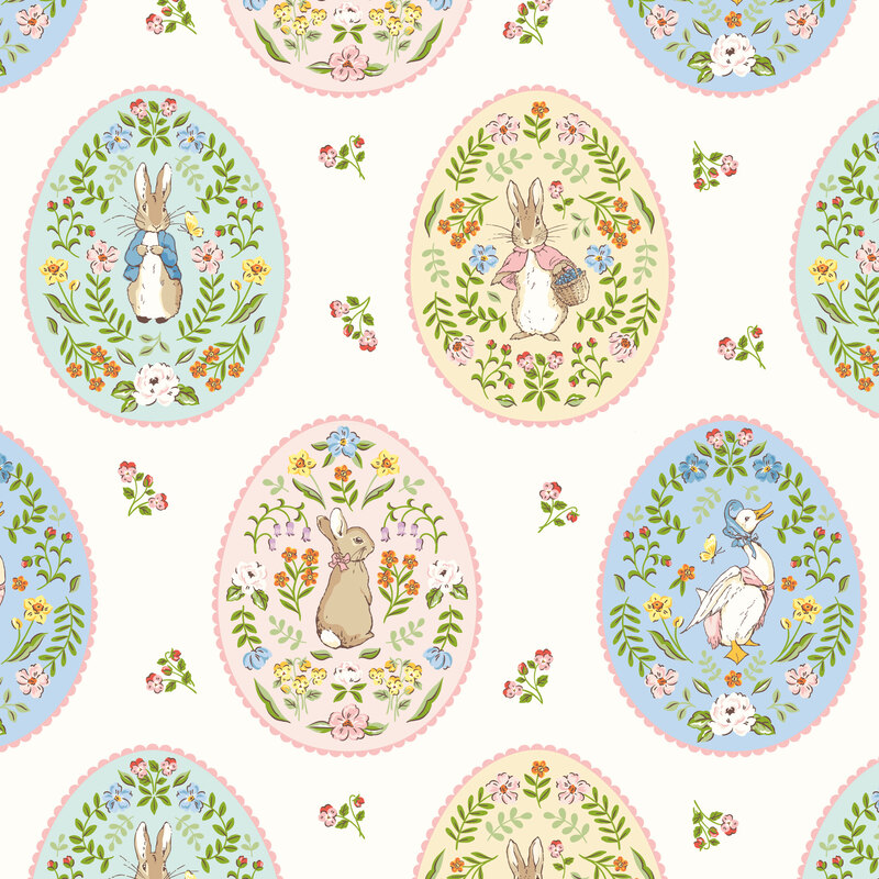 Multicolored eggs filled with florals and a peter rabbit character on a white background with tossed pink floral sprigs.