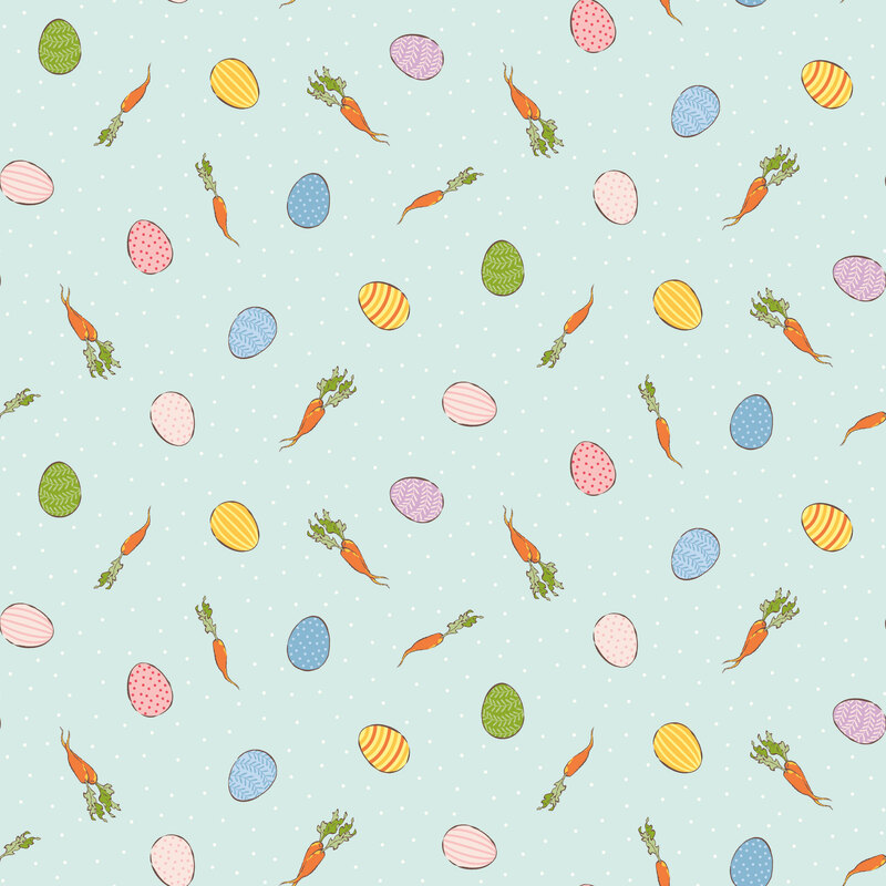 Scattered pattern of easter eggs and carrots with white polka dot accents on an ice blue background.