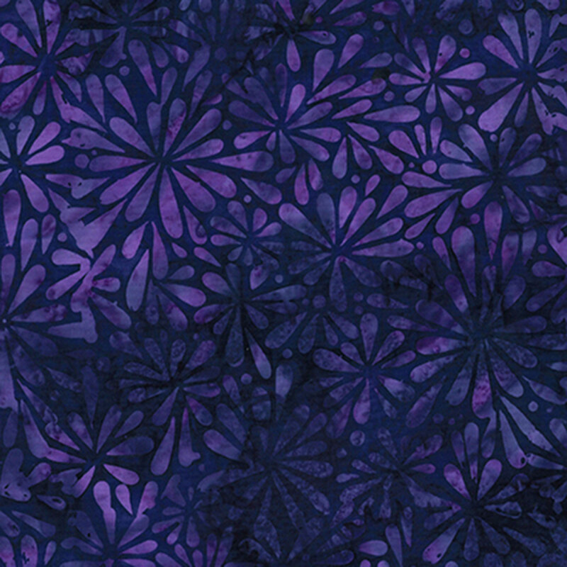 Purple batik with an abstract floral pattern accented with mottled tonal details.  Width