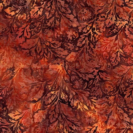 This mottled terra cotta fabric features a oak leaf design. 