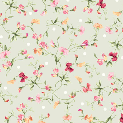 pink and cream floral blossoms with trailing vines on a pale sage background with white polka dots