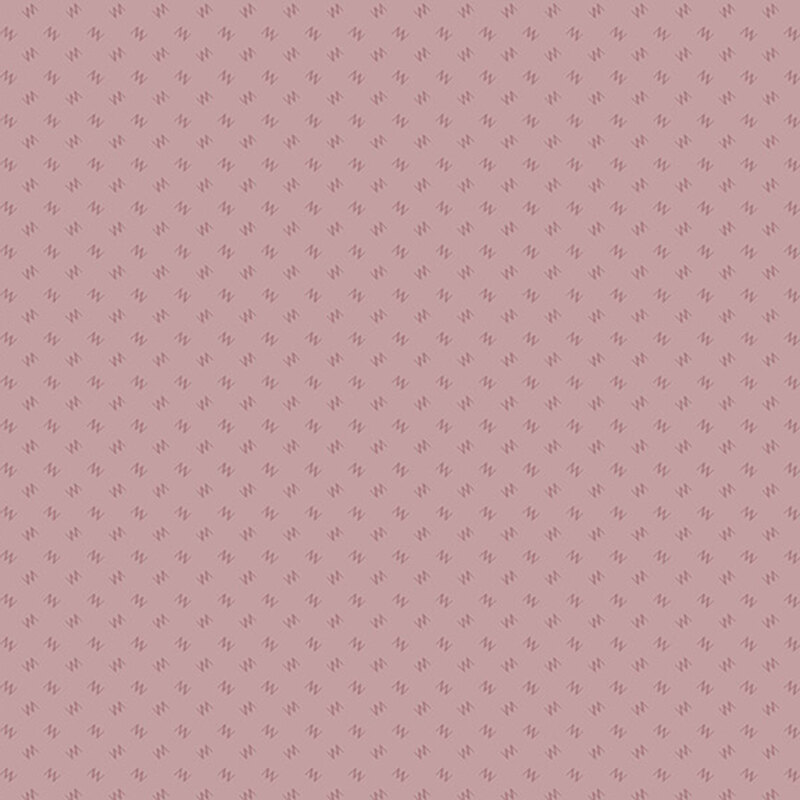 Dusty mauve fabric with small tossed, tonal zig zags.