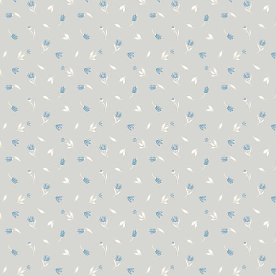 tossed blue tulip blossoms with white leaves on a light gray background.