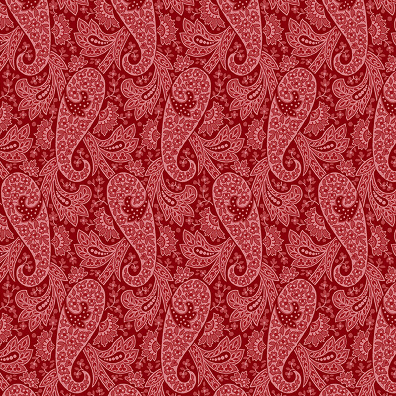 Red fabric with a tonal paisley pattern filled with densely packed floral details.