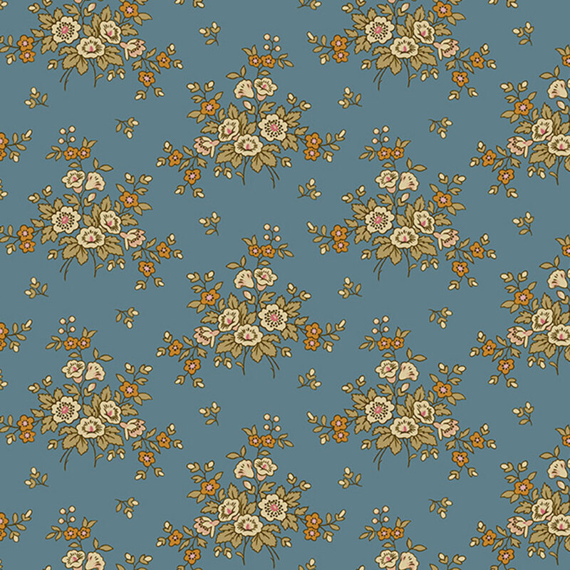 Dusty blue fabric with a clustered pattern of floral bouquets with tulips and leafy accents.