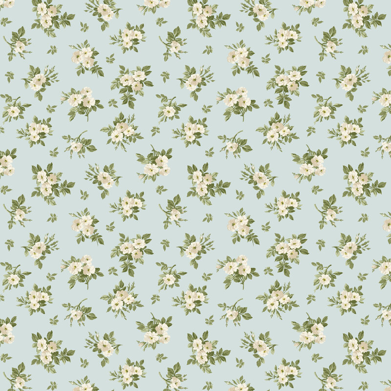 Faded blue fabric with ditsy tossed florals.