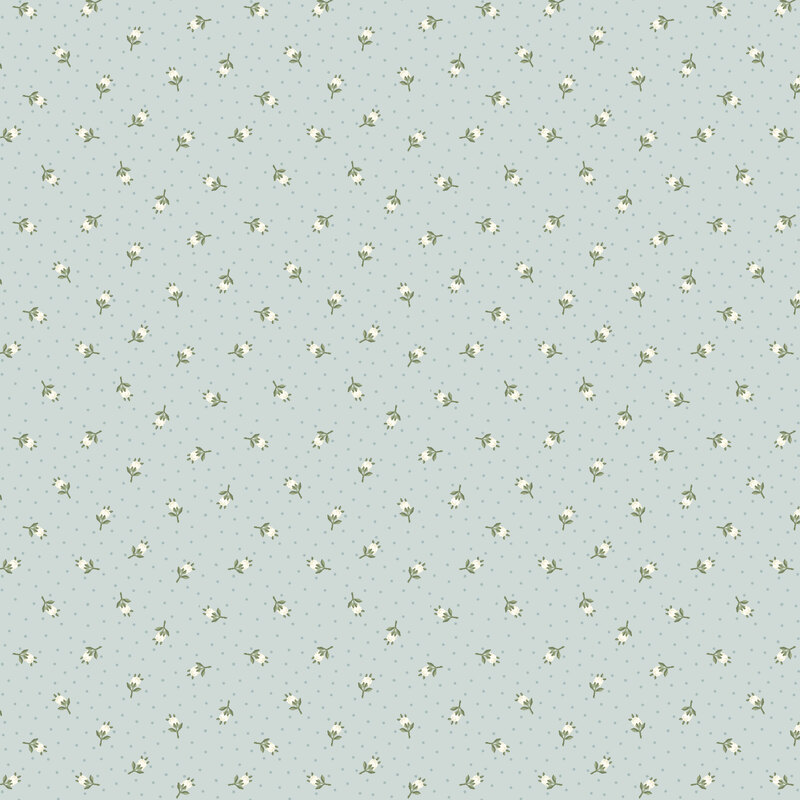Light blue fabric with blue polka dots and scattered floral buds over the top.