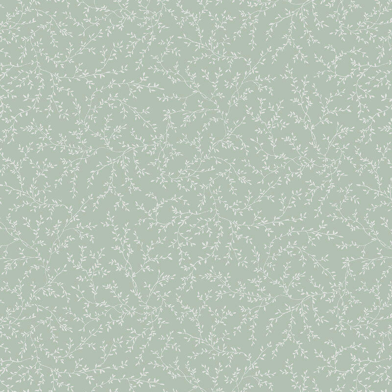 Minty fabric with lighter tonal sprigs and vines strewn across the top.