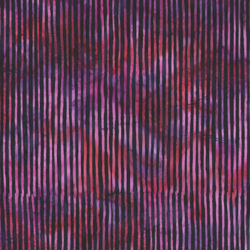 Mauve, purple, and red striped batik fabric.