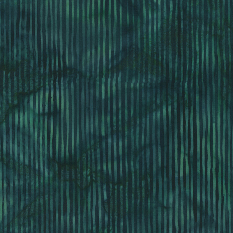 Deep emerald green striped batik fabric.