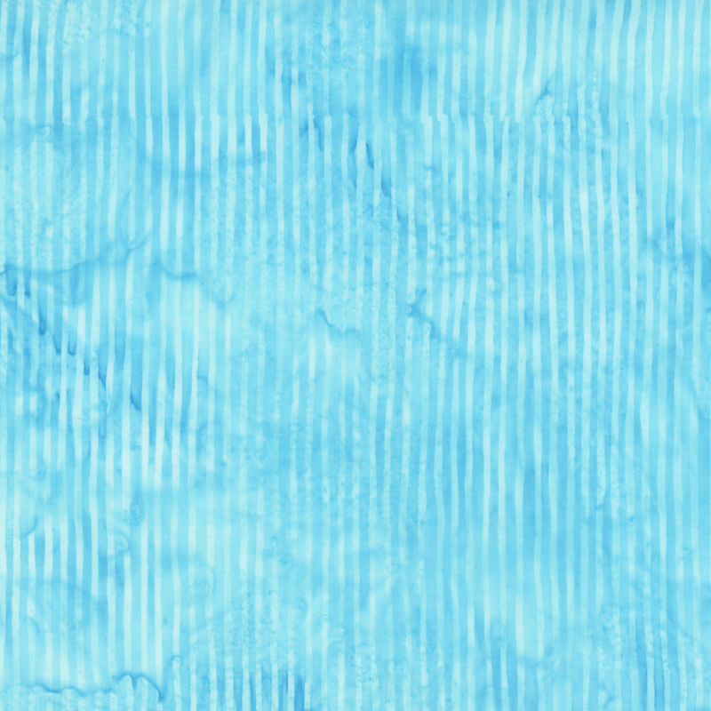 Bright ocean blue striped batik fabric.