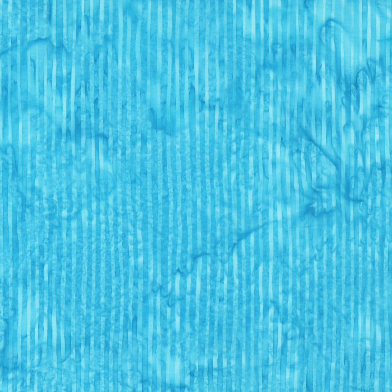 Rich ocean blue tonal striped batik fabric.