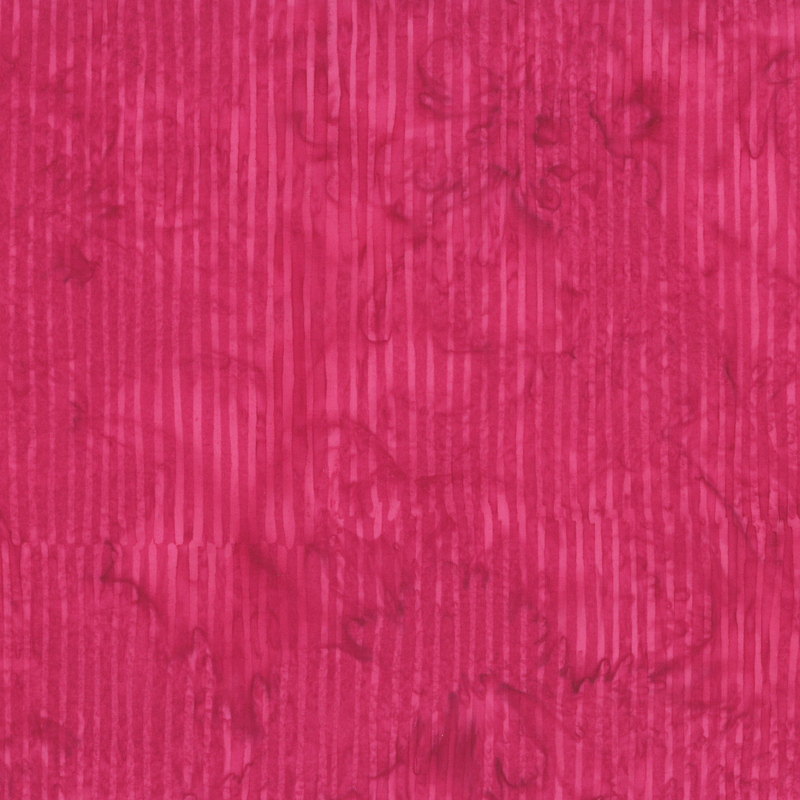 Hot pink striped batik fabric.