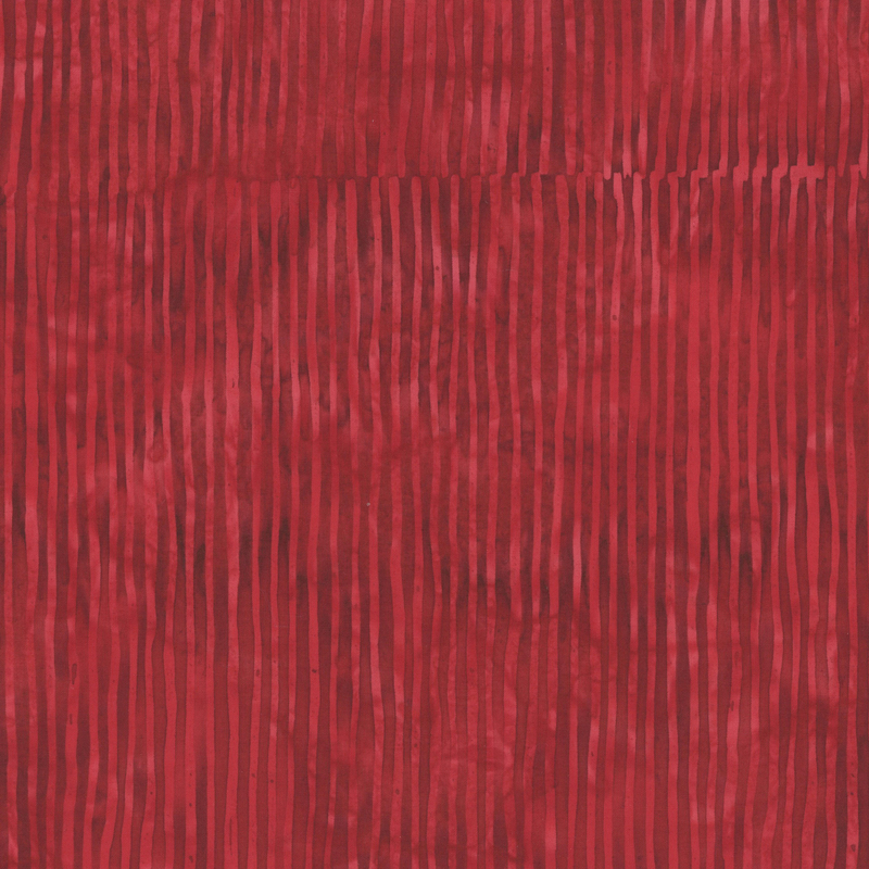Dark red striped batik fabric.