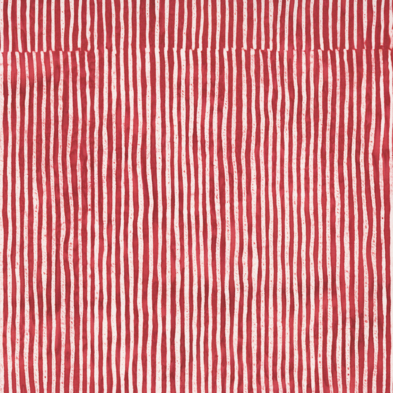 Red and white striped batik fabric.