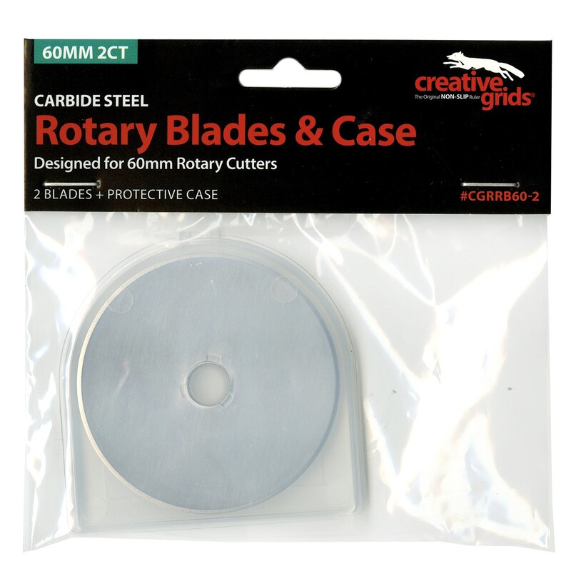 Package of two 60mm carbide steel rotary blades for Creative Grids® cutter, with a protective case.