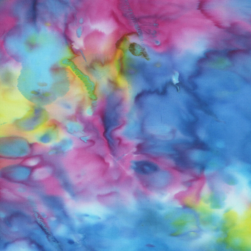 Watercolor batik fabric with rainbow mottling.